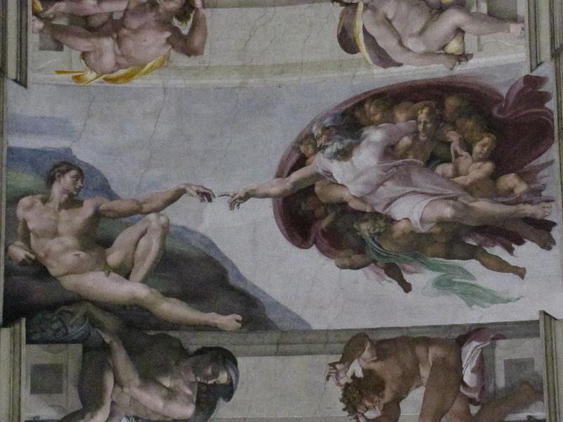 sixtijnse kapel_creation of adam.jpg - De waarschijnlijk bekendste fresco uit de Sixtijnse kapel. De schepping, waarin God Adam leven geeft.